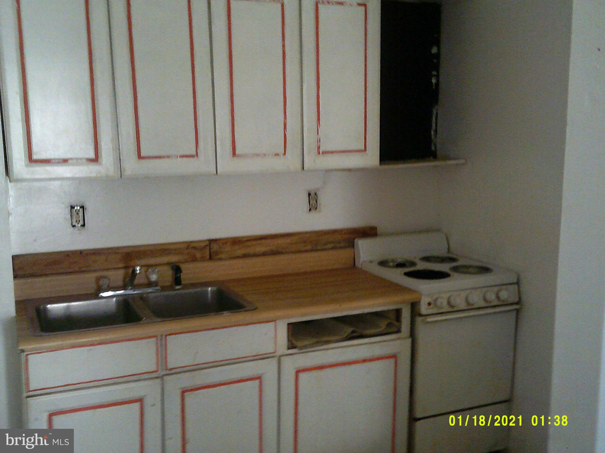 14210 Croghan Pike Mount Union, PA 17066 - Photo 9 of 12 a kitchen with stainless steel appliances granite countertop white cabinets and a stove
