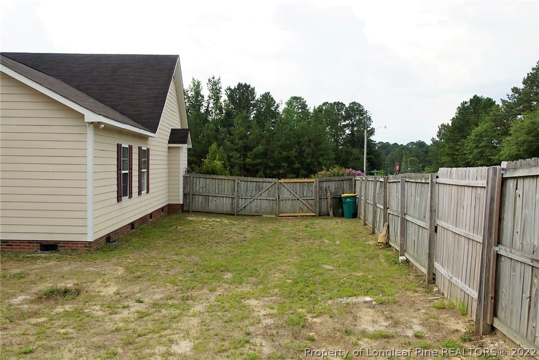 5836 Spreading Branch Road Hope Mills, NC 28348 - Photo 19 of 48 a view of a backyard