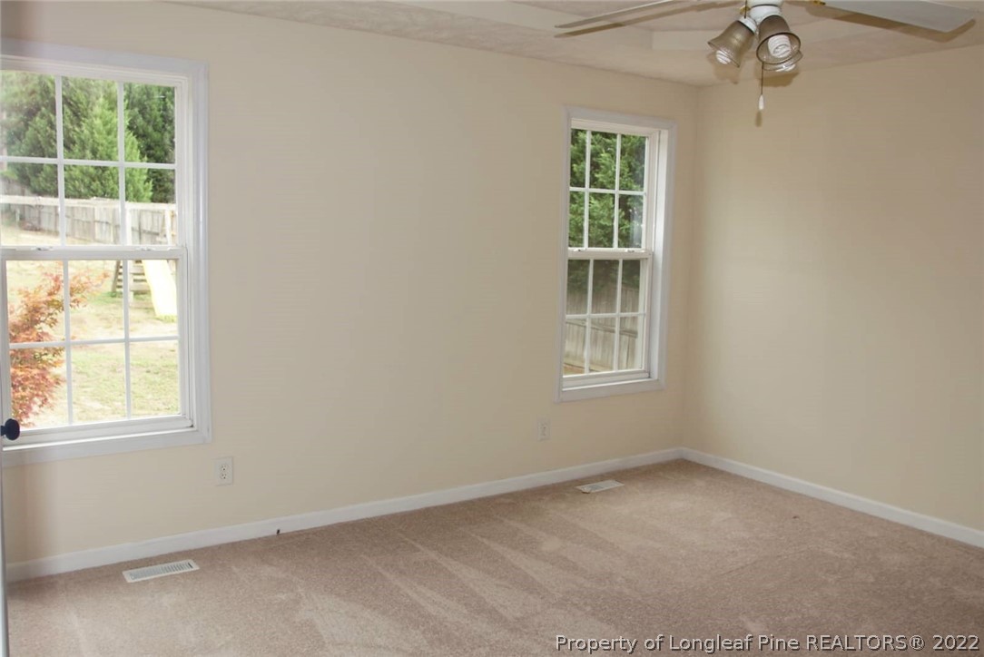 5836 Spreading Branch Road Hope Mills, NC 28348 - Photo 29 of 48 an empty room with a window