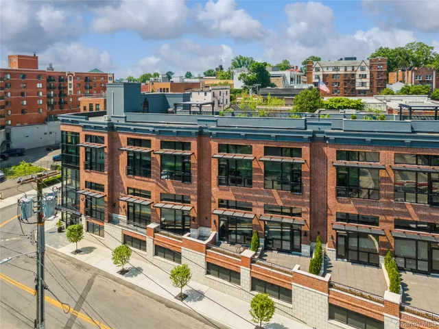 a view of a city with tall buildings