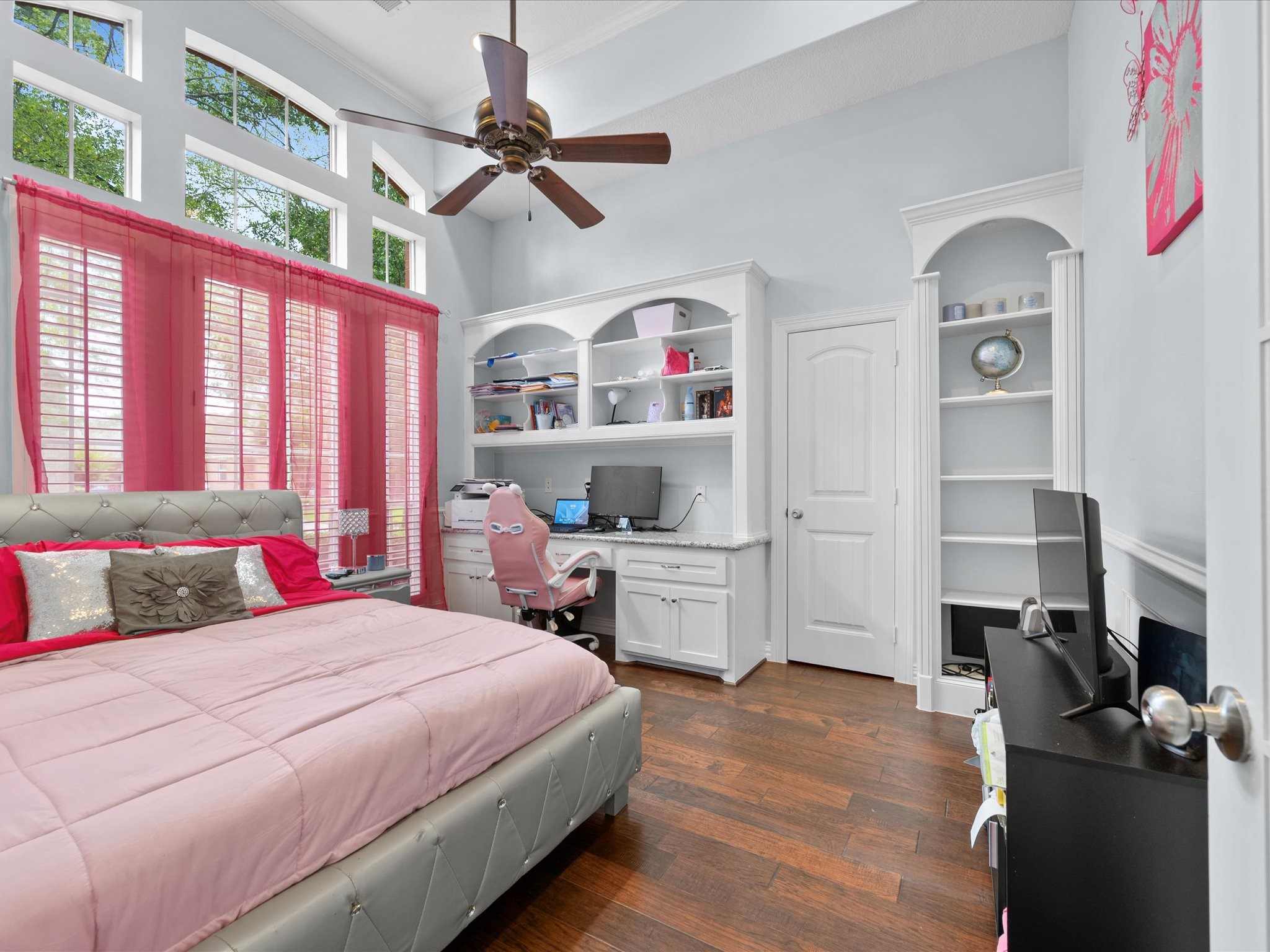 16123 Lafone Drive Spring, TX 77379 - Photo 10 of 47 Serene and sunlit, this versatile home office—easily serving as an additional bedroom—features soaring ceilings and a peaceful atmosphere ideal for work, study, or quiet retreat.