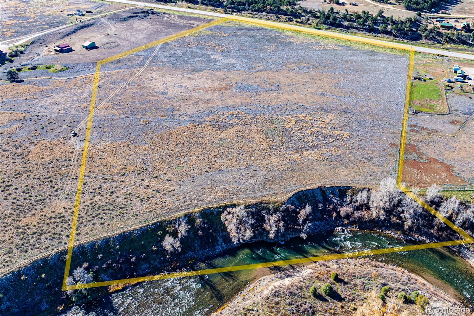 10817 Highway 50 Howard, CO 81233 - Photo 31 of 34 a view of a yard with an outdoor space