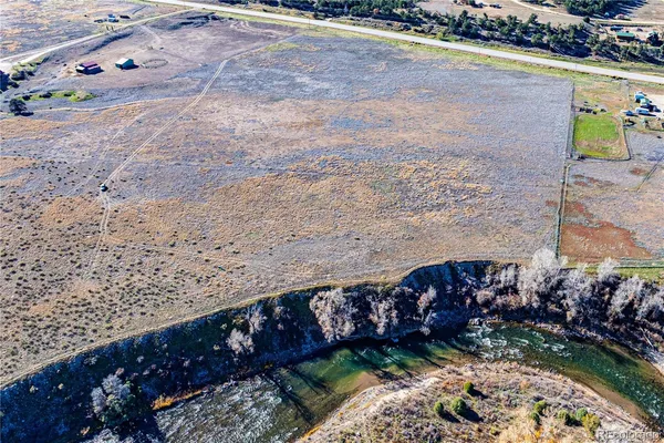 a view of a garden with an outdoor space