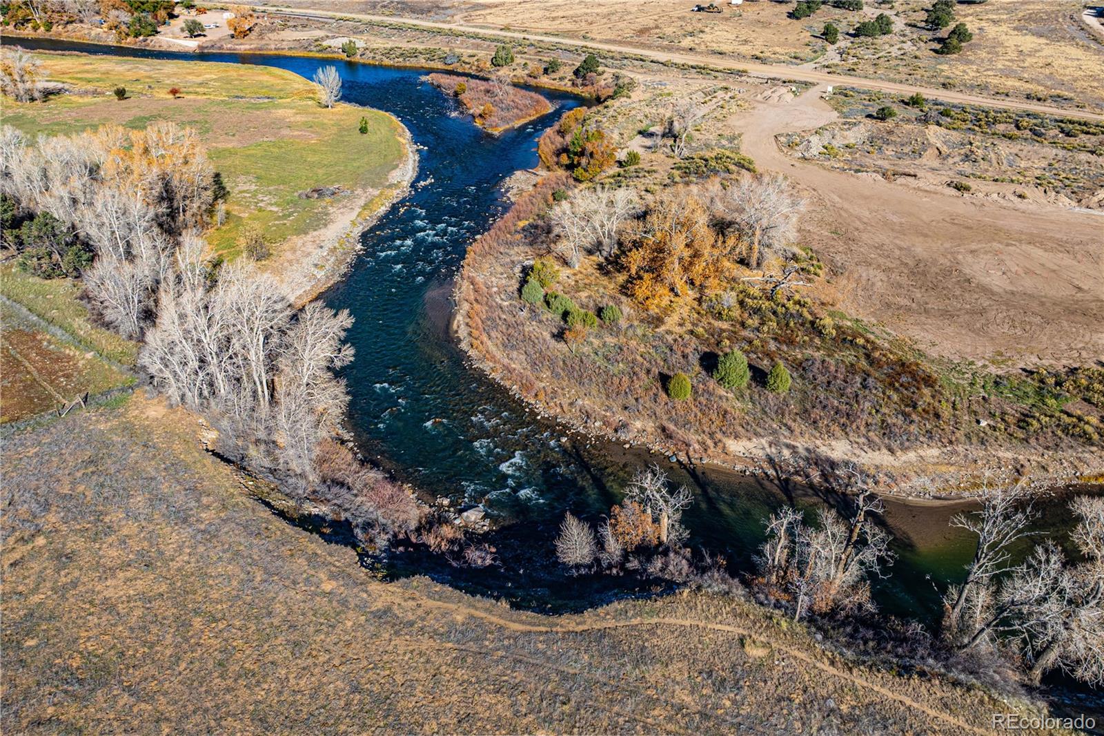 10817 Highway 50 Howard, CO 81233 - Photo 4 of 34 a view of swimming pool with a yard