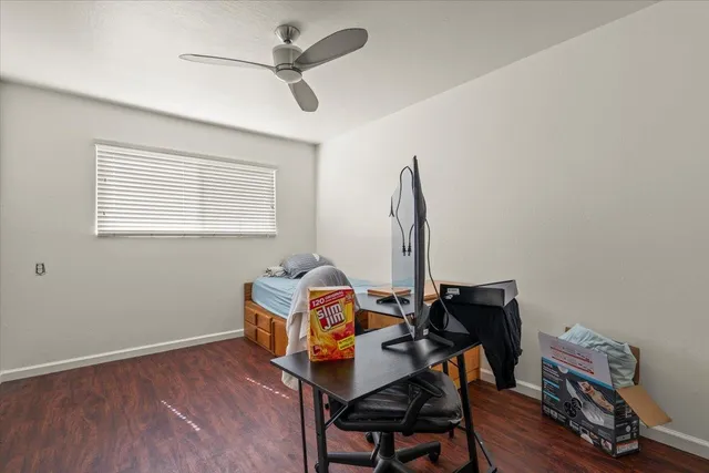 a room with furniture and wooden floor