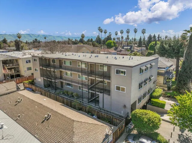 a view of a balcony with city view