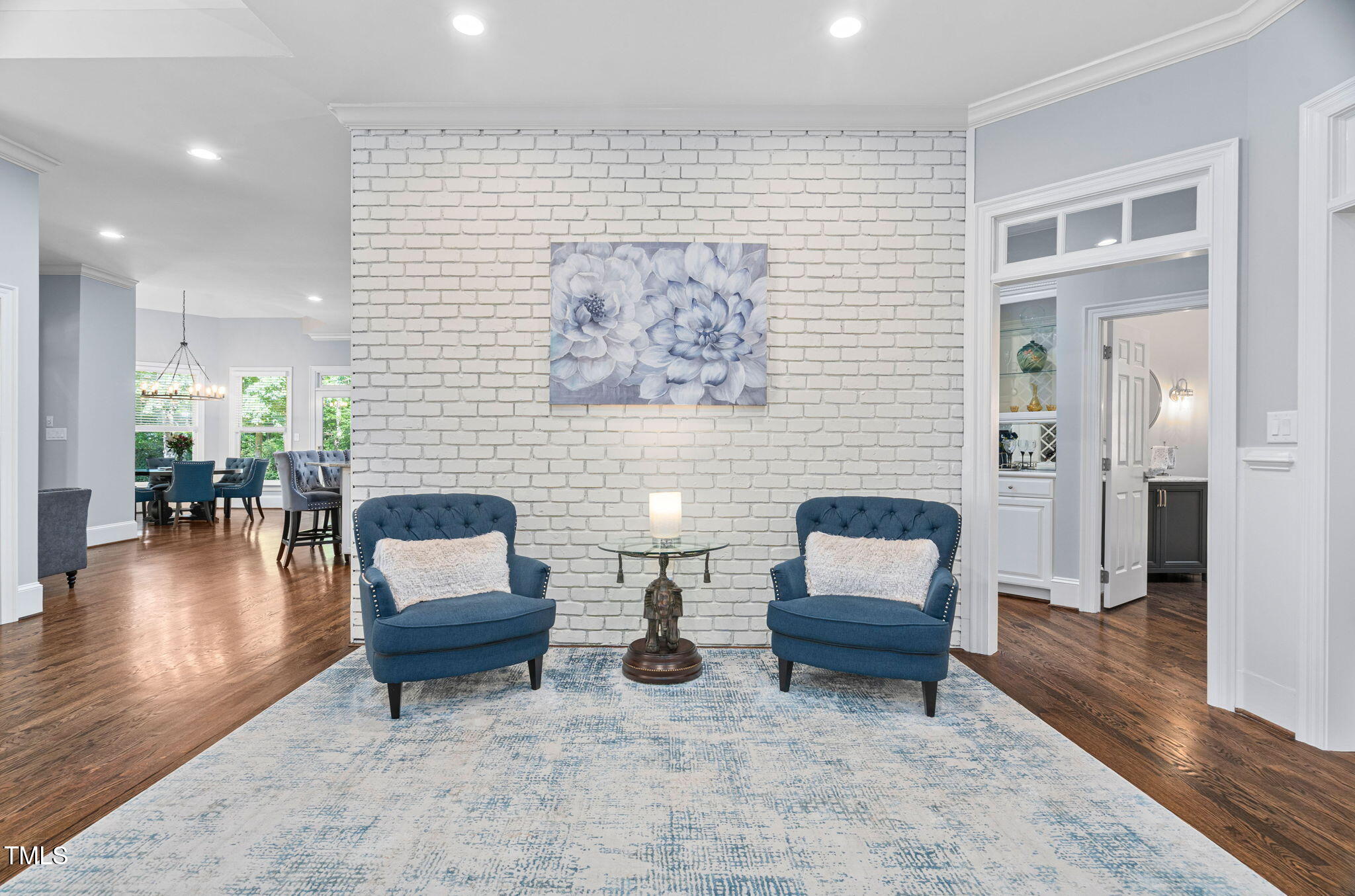 114 Kendleton Place Cary, NC 27518 - Photo 11 of 88 a living room with furniture and a wooden floor