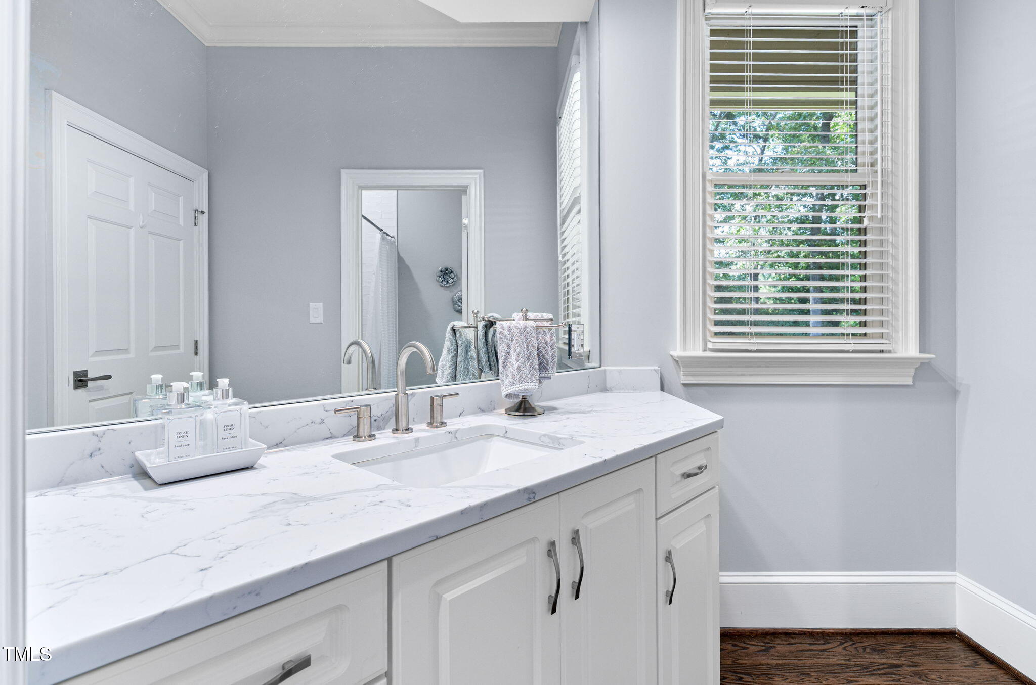 114 Kendleton Place Cary, NC 27518 - Photo 36 of 88 a bathroom with a sink and a mirror