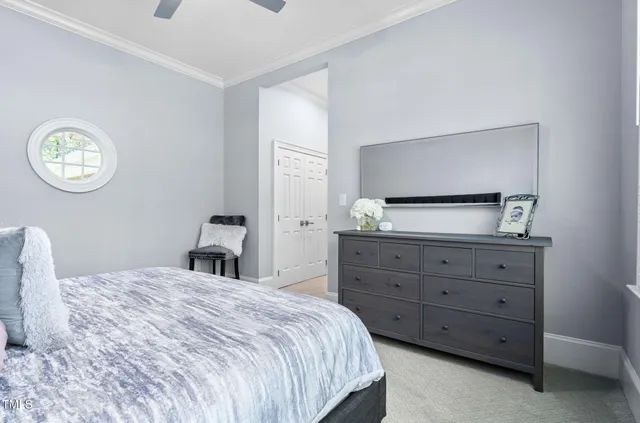 a front view of a house with a yard table and chairs
