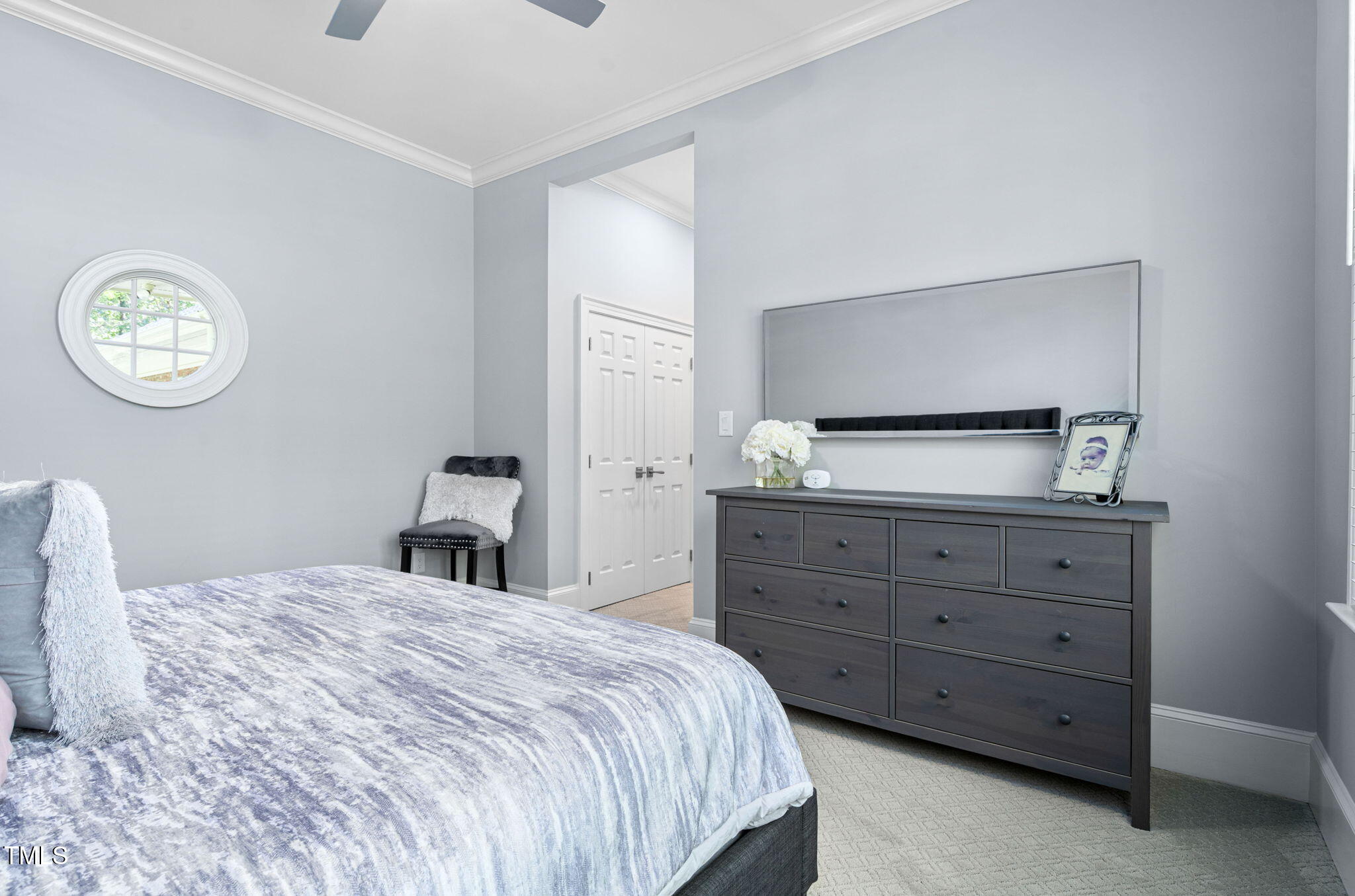 114 Kendleton Place Cary, NC 27518 - Photo 38 of 88 a bedroom with a bed and a dresser