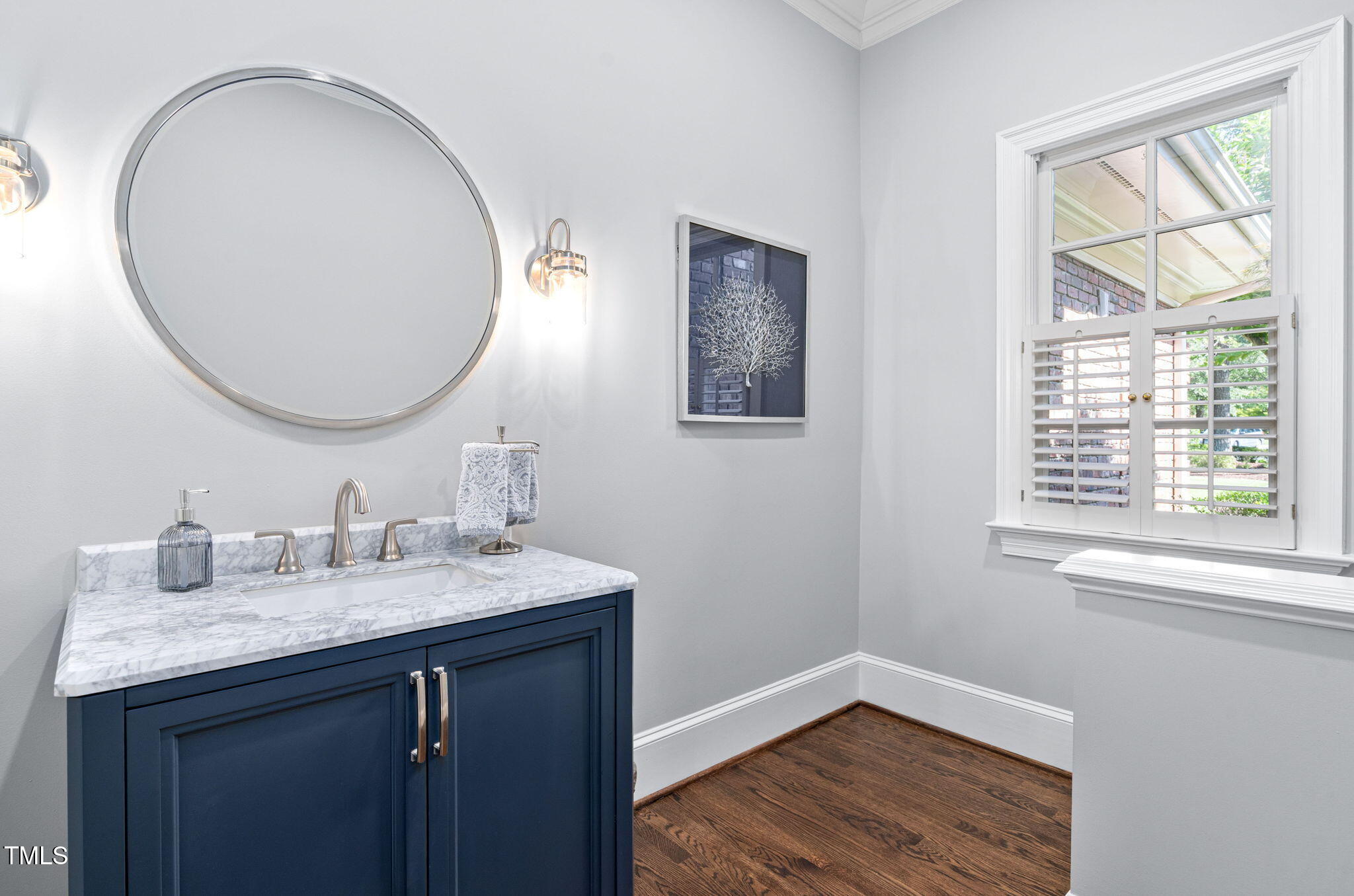 114 Kendleton Place Cary, NC 27518 - Photo 39 of 88 a bathroom with a sink and a mirror
