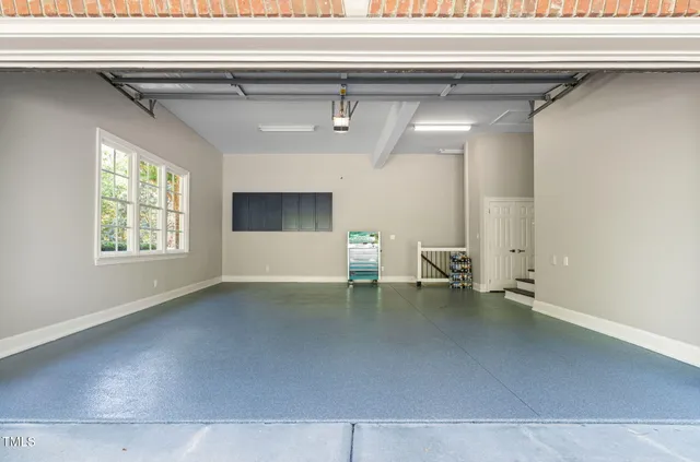 a view of backyard with seating area and green space