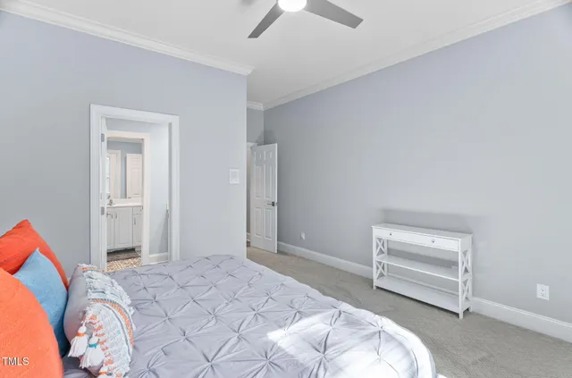 an aerial view of a house with a yard basket ball court and outdoor seating