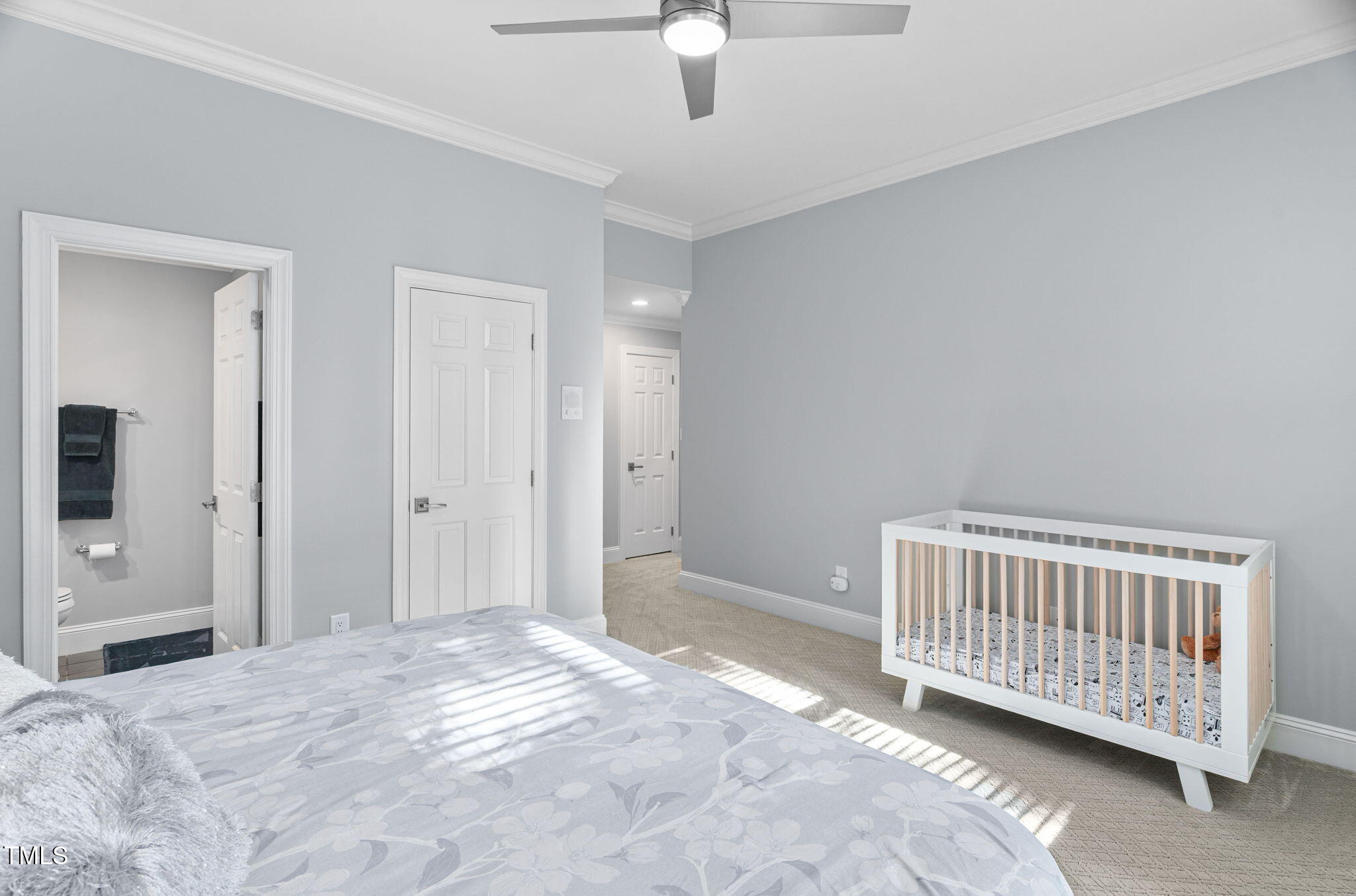 114 Kendleton Place Cary, NC 27518 - Photo 50 of 88 a view of a bedroom with wooden floor & a ceiling fan