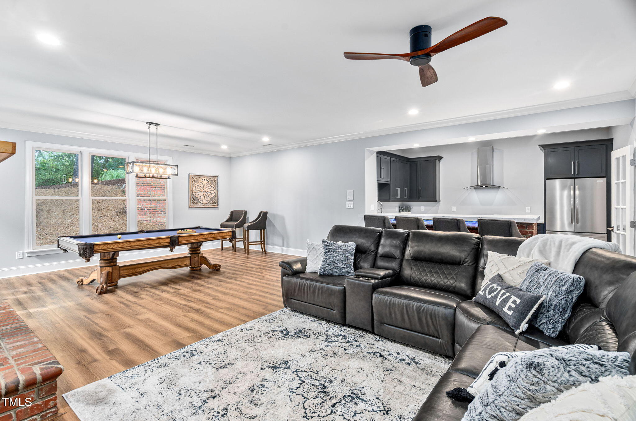 114 Kendleton Place Cary, NC 27518 - Photo 54 of 88 a living room with furniture and a wooden floor