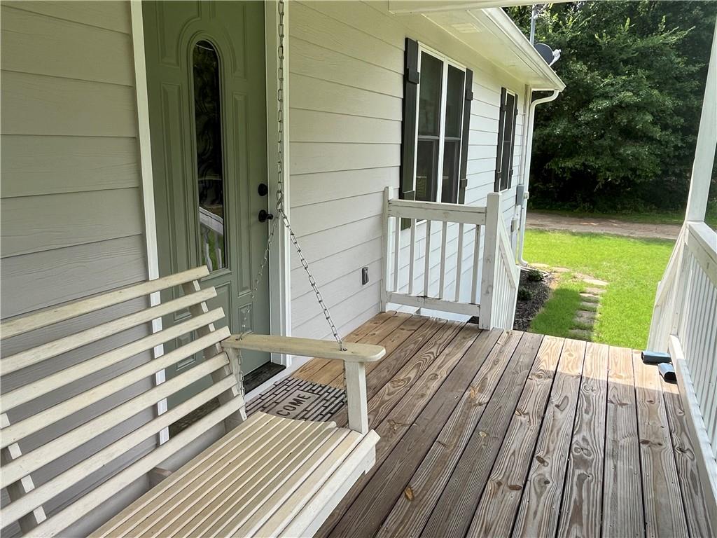 1429 Thyatira Brockton Road Jefferson, GA 30549 - Photo 14 of 46 a view of backyard with wooden floor and fence