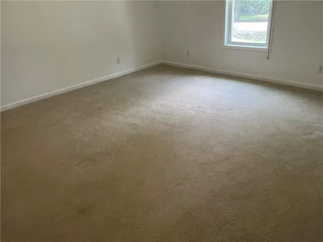 an empty room with a window