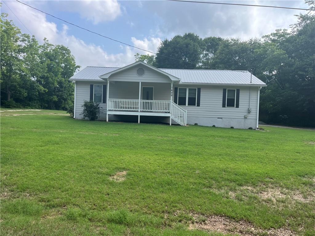 1429 Thyatira Brockton Road Jefferson, GA 30549 - Photo 2 of 46 a front view of a house with garden