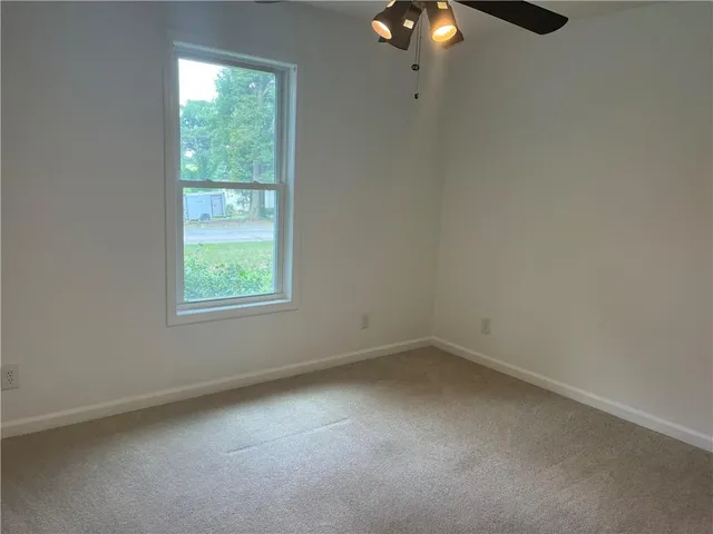 an empty room with window