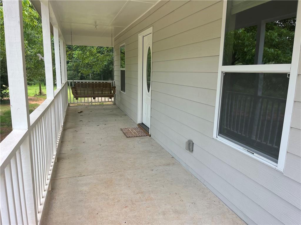 1429 Thyatira Brockton Road Jefferson, GA 30549 - Photo 32 of 46 a view of a porch
