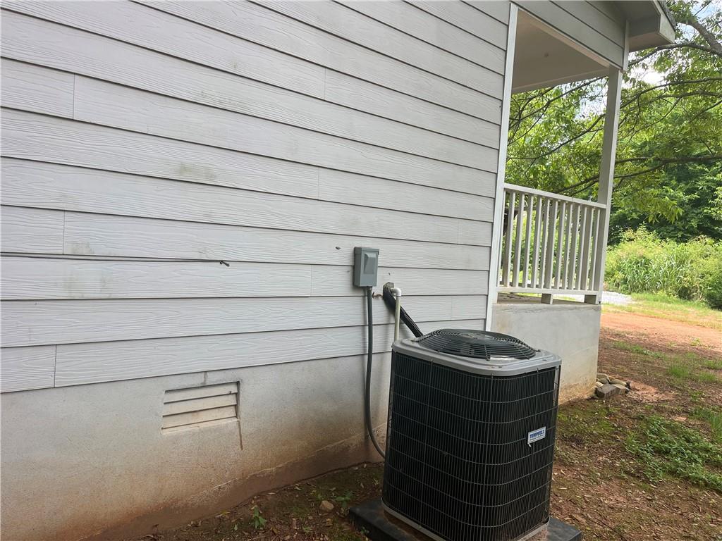 1429 Thyatira Brockton Road Jefferson, GA 30549 - Photo 36 of 46 a bathroom with a sink and a shower