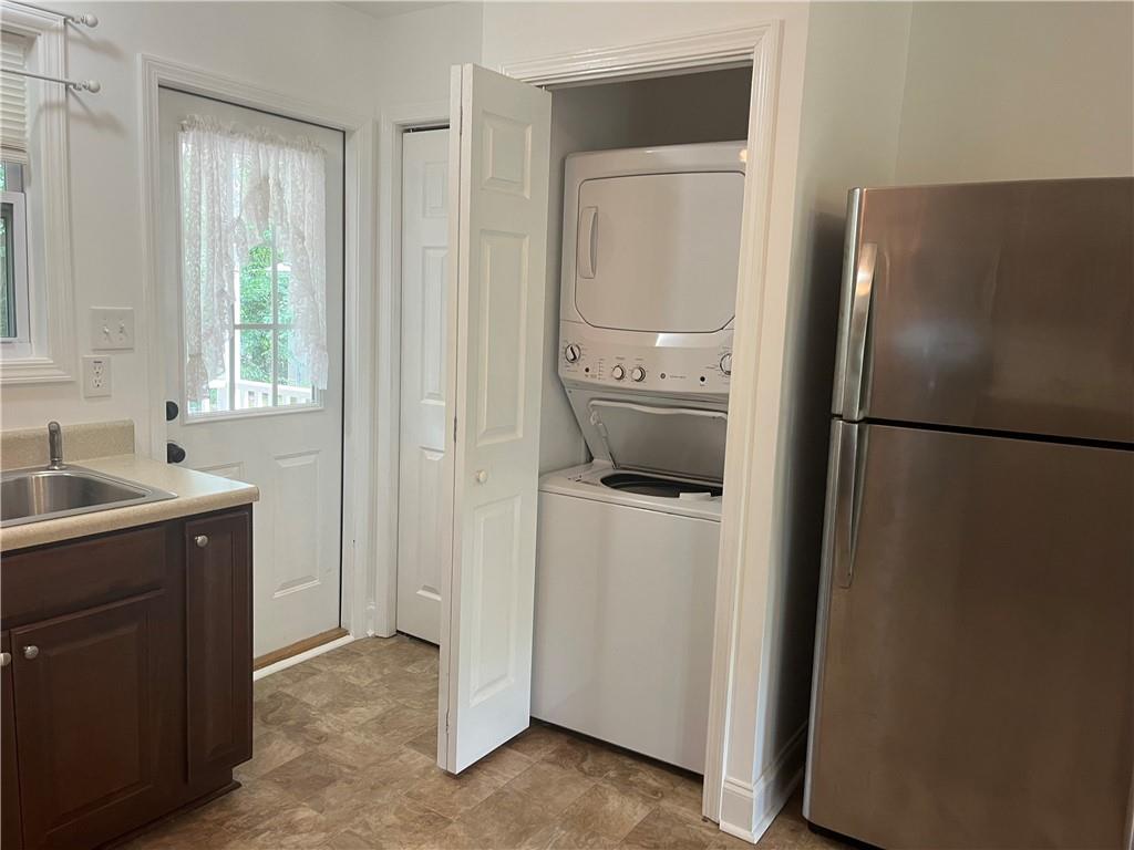 1429 Thyatira Brockton Road Jefferson, GA 30549 - Photo 40 of 46 a kitchen with a refrigerator and a sink
