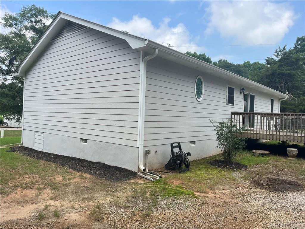 1429 Thyatira Brockton Road Jefferson, GA 30549 - Photo 5 of 46 a view of a small house with a yard
