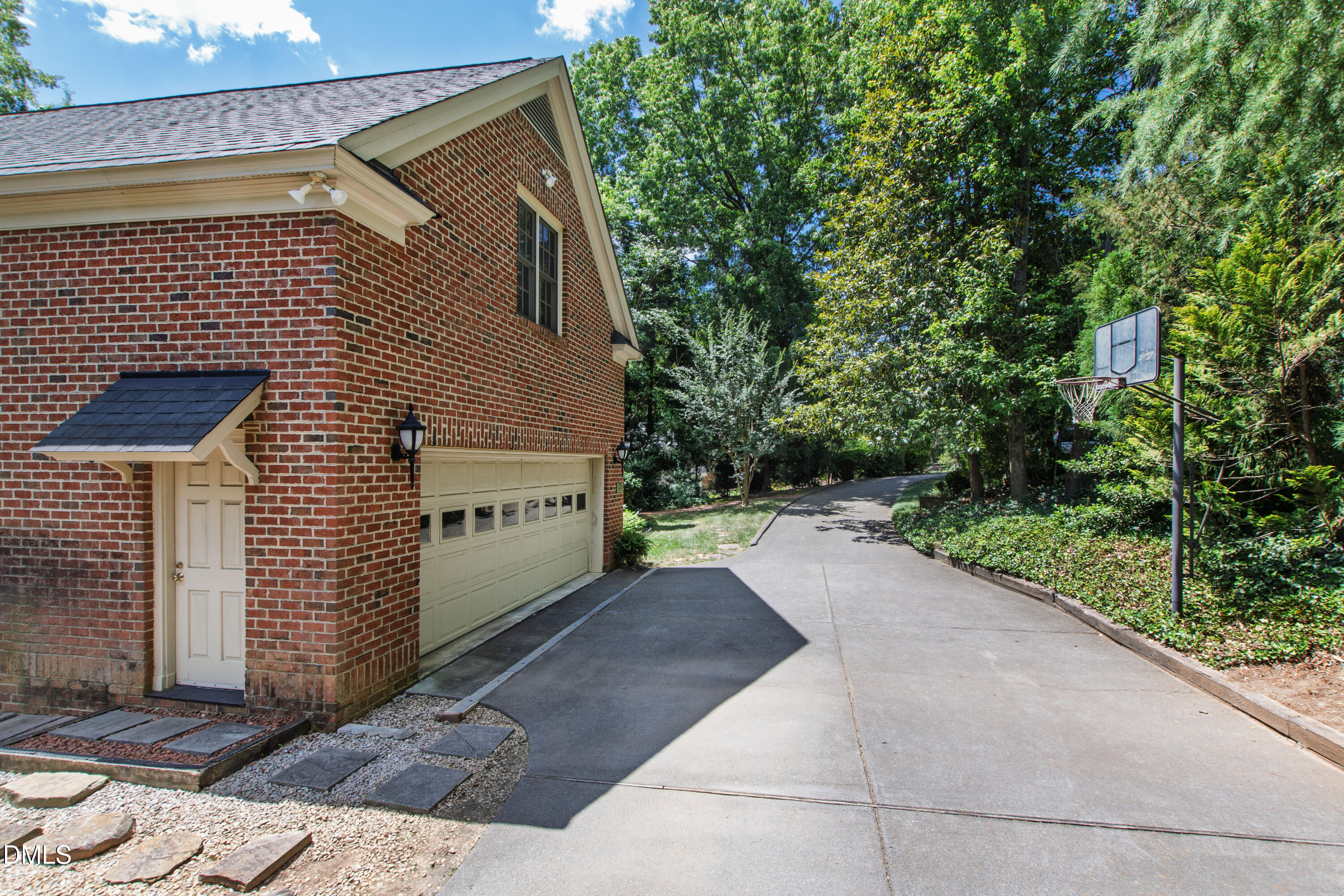 3708 Lubbock Drive Raleigh, NC 27612 - Photo 59 of 64 a back view of a house with a yard