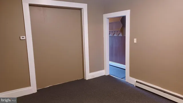 an empty room with closet