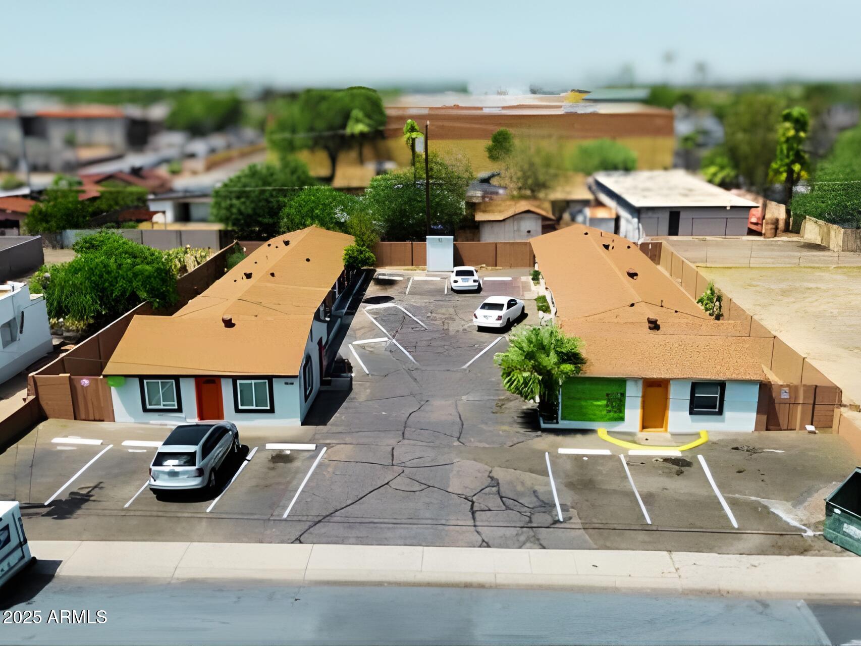 8910-8912 North 3rd Street Phoenix, AZ 85020 - Photo 1 of 37 an aerial view of a house with swimming pool and patio