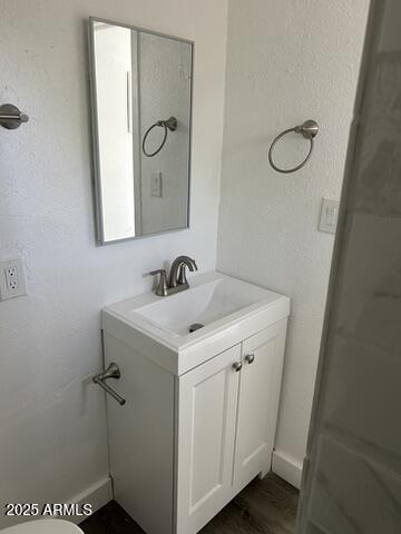 8910-8912 North 3rd Street Phoenix, AZ 85020 - Photo 15 of 37 a bathroom with a sink and a mirror