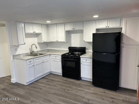 8910-8912 North 3rd Street Phoenix, AZ 85020 - Photo 27 of 37 a kitchen with a refrigerator stove and sink