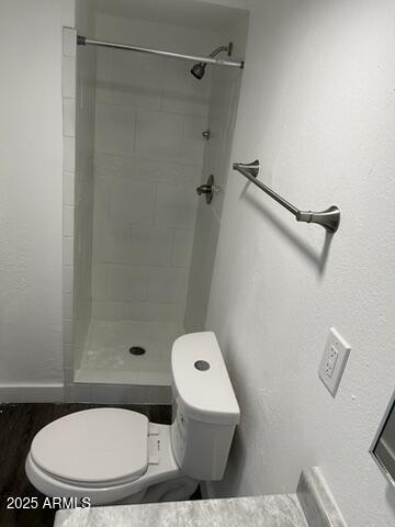 8910-8912 North 3rd Street Phoenix, AZ 85020 - Photo 31 of 37 a bathroom with a toilet and a shower