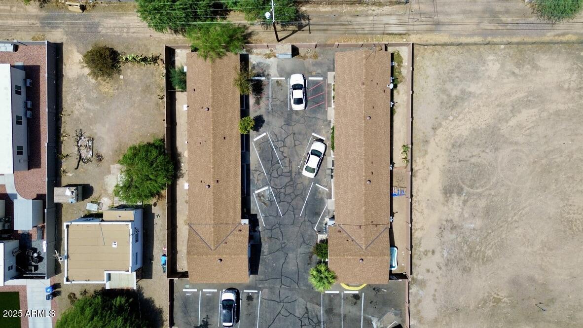 8910-8912 North 3rd Street Phoenix, AZ 85020 - Photo 4 of 37 an aerial view of a residential houses with outdoor space and parking