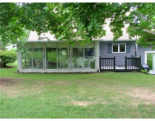 624 Scott Ridge Road Harmony, PA 16037 - Photo 7 of 18 Patio/Deck. Back of home with sun room and deck