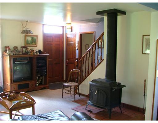 624 Scott Ridge Road Harmony, PA 16037 - Photo 10 of 18 Living Room. Living room with wood burning stove