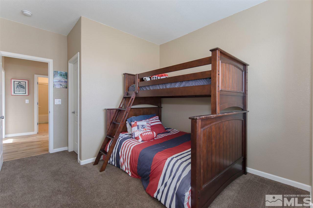 400 Parade Drive Reno, NV 89521 - Photo 18 of 24 a bedroom with a bed and a closet