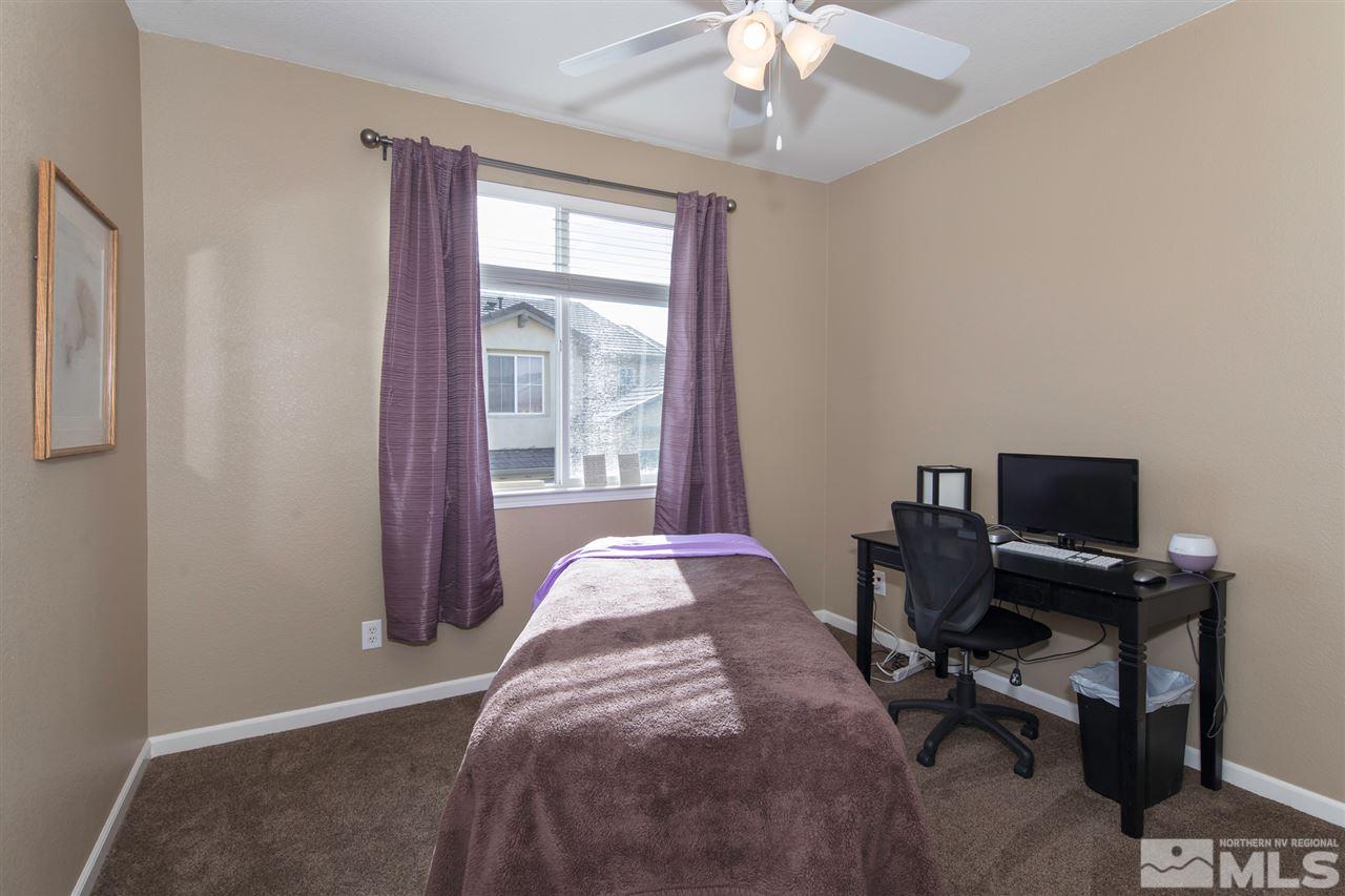 400 Parade Drive Reno, NV 89521 - Photo 20 of 24 a view of a livingroom with workspace and a window
