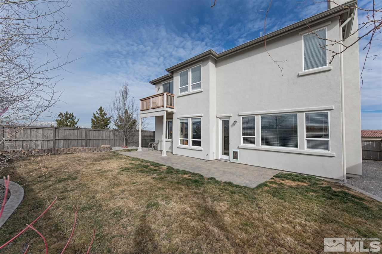 400 Parade Drive Reno, NV 89521 - Photo 23 of 24 a front view of a house with a yard