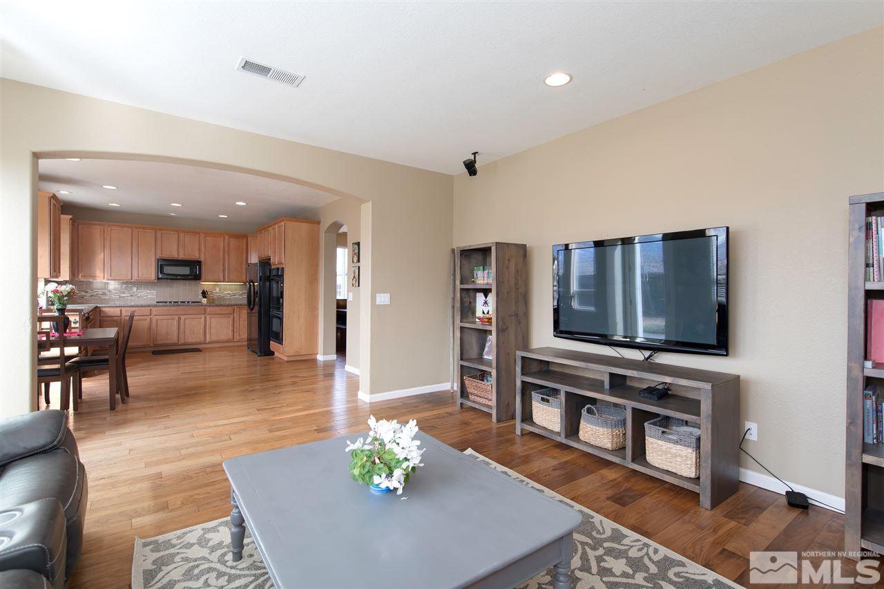 400 Parade Drive Reno, NV 89521 - Photo 7 of 24 a living room with furniture and a flat screen tv