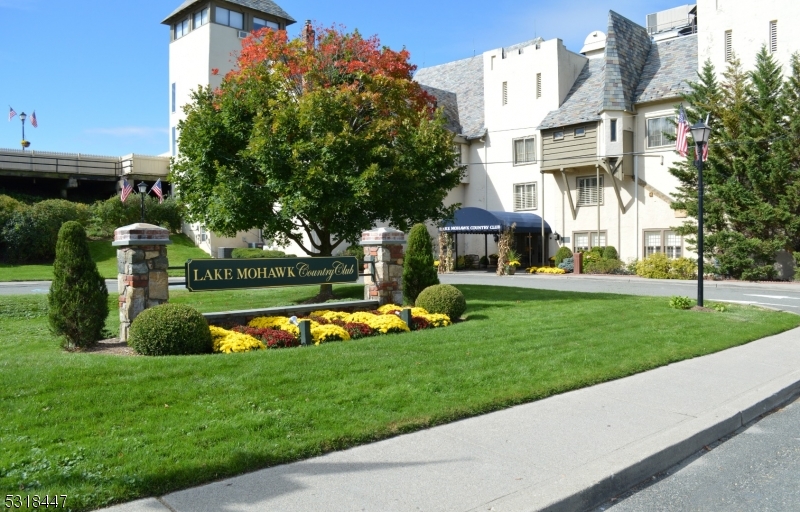 49 Ledgewood Trail Sparta, NJ 07871 - Photo 2 of 3 a view of a building with a yard