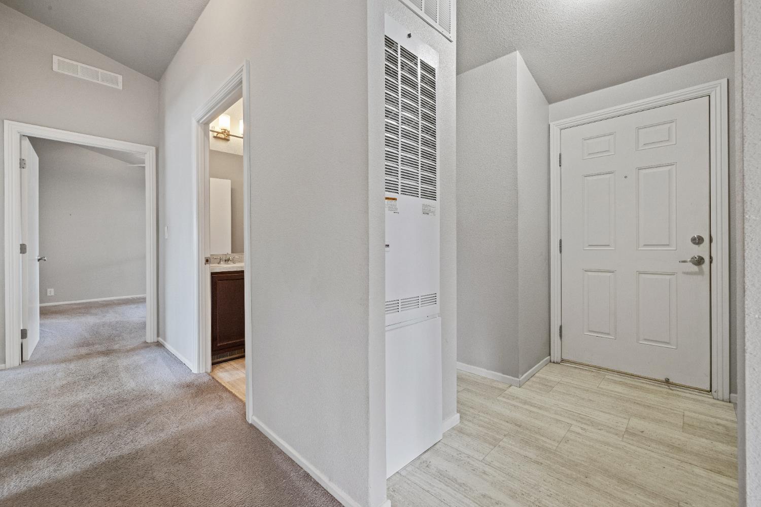 2621 Prescott, Unit 92 Modesto, CA 95350 - Photo 12 of 25 wooden floor with white walls