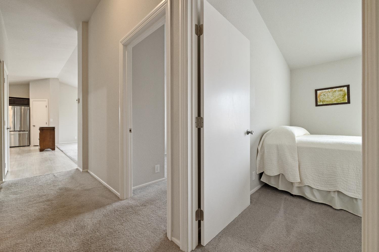 2621 Prescott, Unit 92 Modesto, CA 95350 - Photo 19 of 25 a view of a bathroom with a washer and dryer