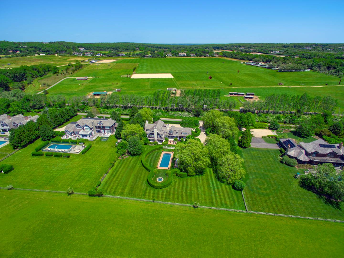 10 Dannielles Way Bridgehampton, NY 11976 - Photo 2 of 27 a green field with lots of bushes