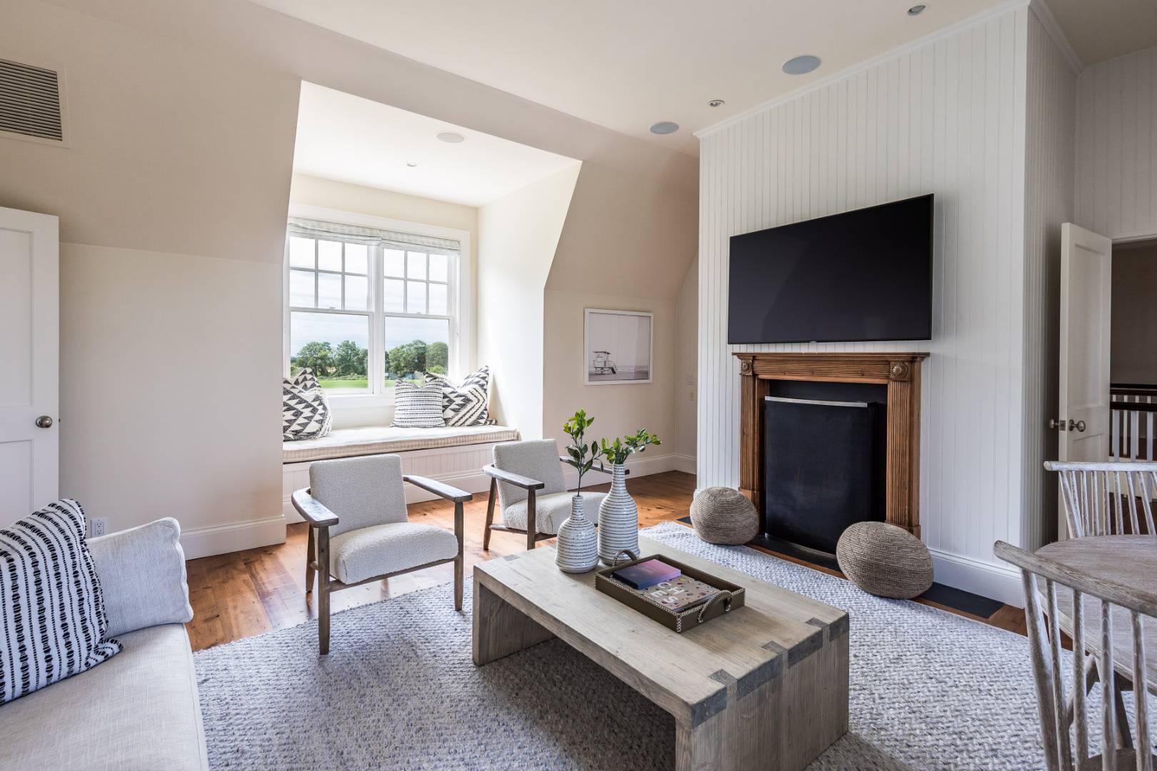10 Dannielles Way Bridgehampton, NY 11976 - Photo 14 of 27 a living room with furniture and a fireplace