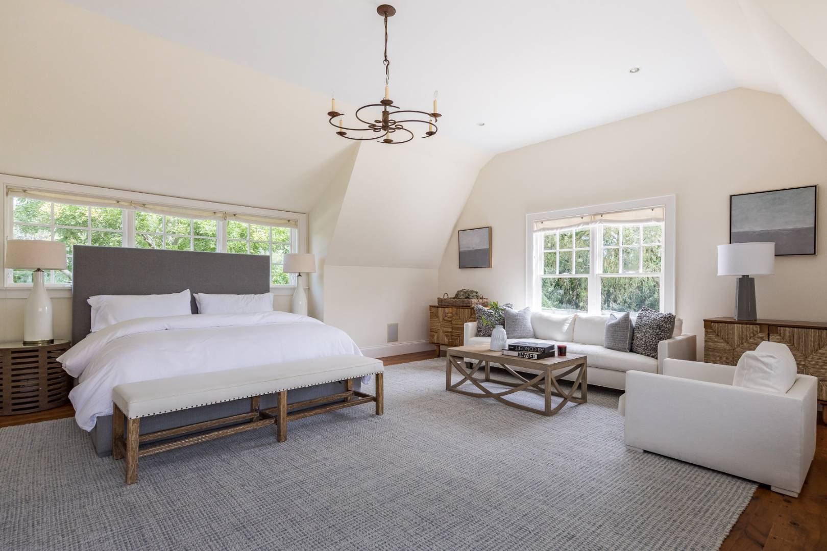 10 Dannielles Way Bridgehampton, NY 11976 - Photo 16 of 27 a bedroom with a bed couch and window