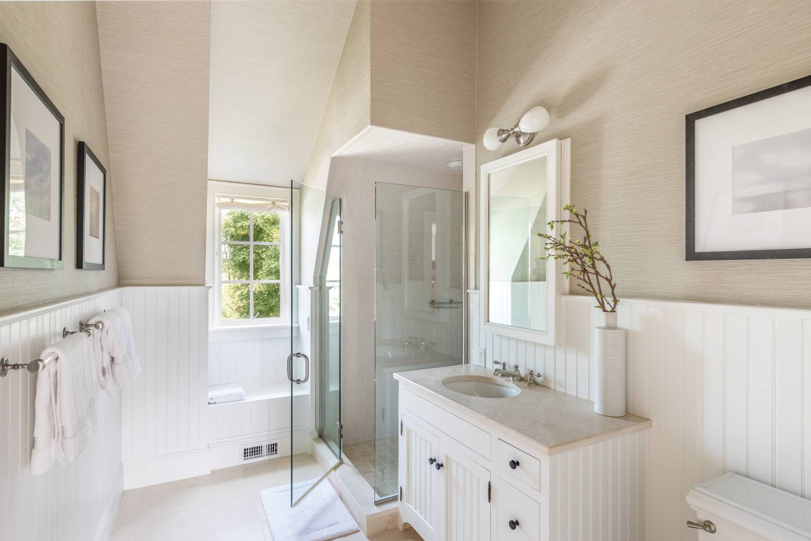 10 Dannielles Way Bridgehampton, NY 11976 - Photo 17 of 27 a bathroom with a sink a toilet and a large mirror