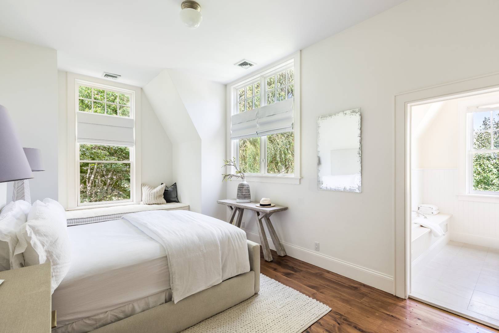 10 Dannielles Way Bridgehampton, NY 11976 - Photo 18 of 27 a bedroom with a bed and a window