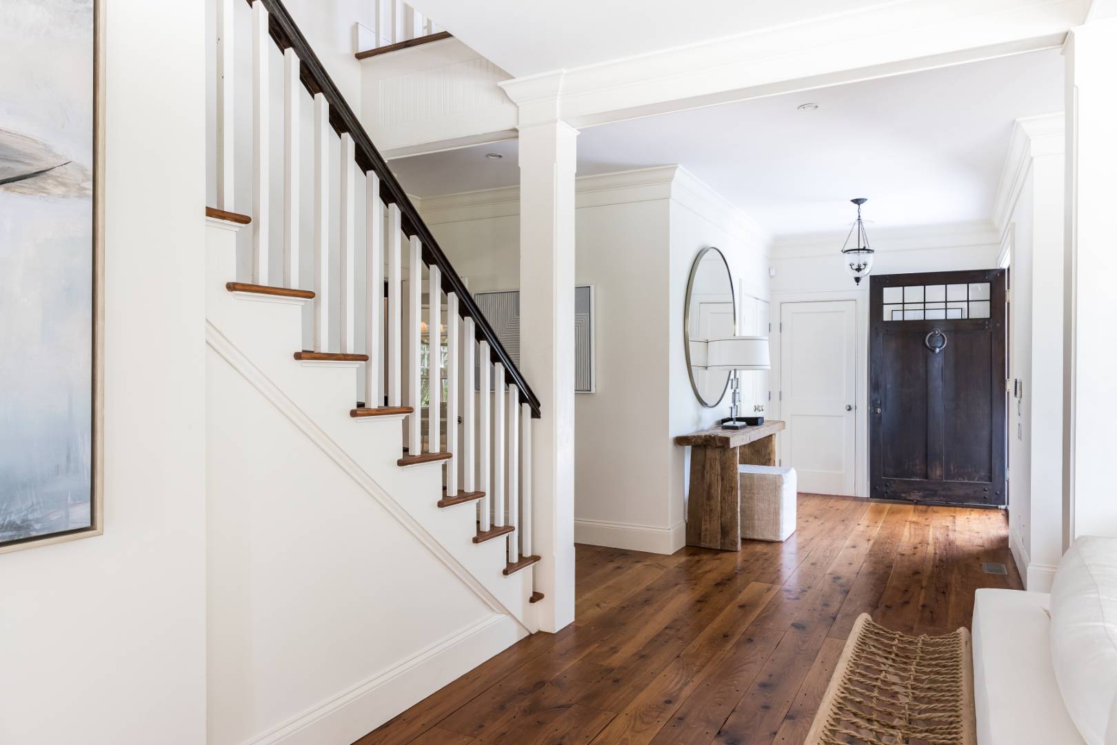 10 Dannielles Way Bridgehampton, NY 11976 - Photo 7 of 27 a view of an entryway with wooden floor and door