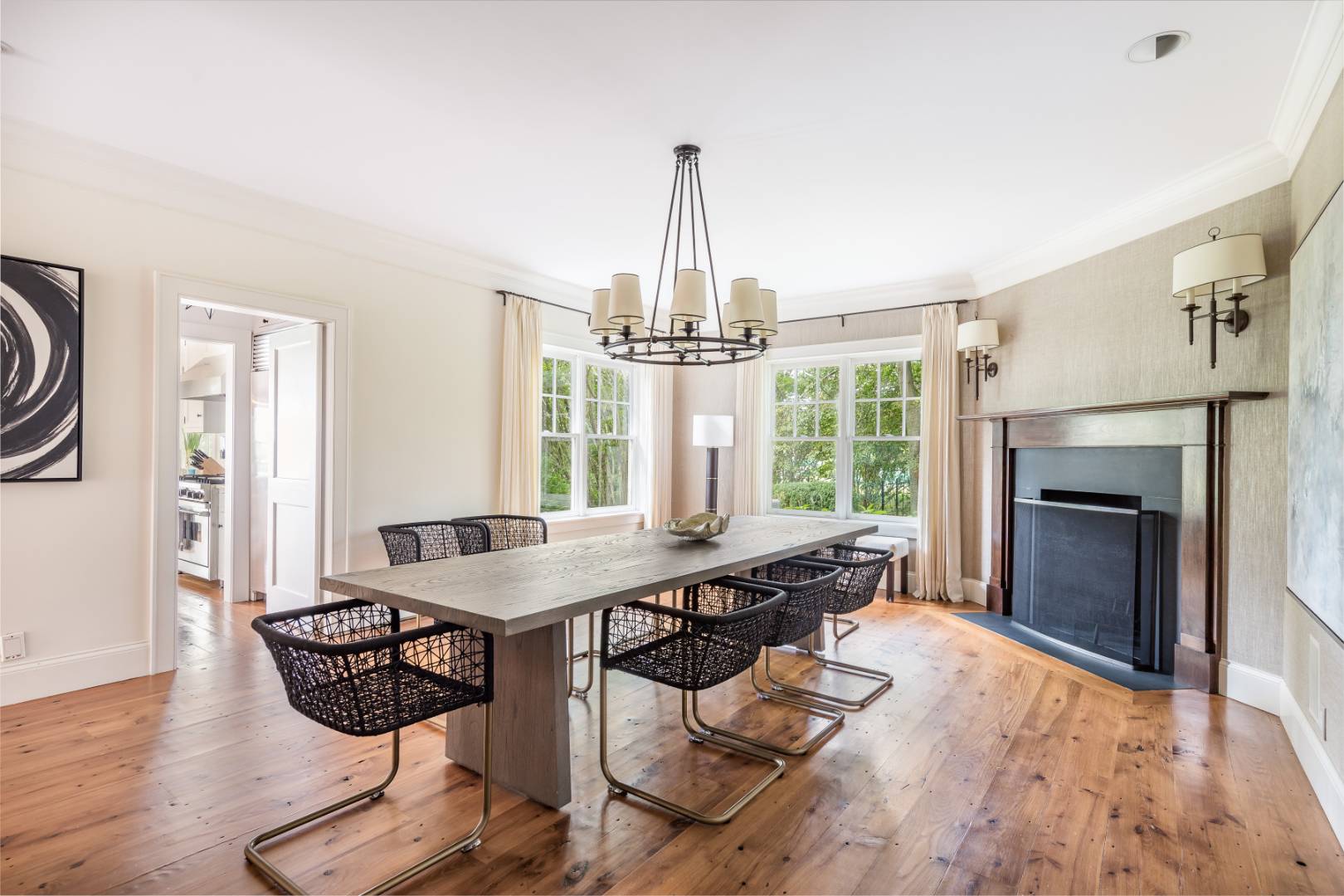 10 Dannielles Way Bridgehampton, NY 11976 - Photo 10 of 27 a dining room with furniture window wooden floor and a chandelier